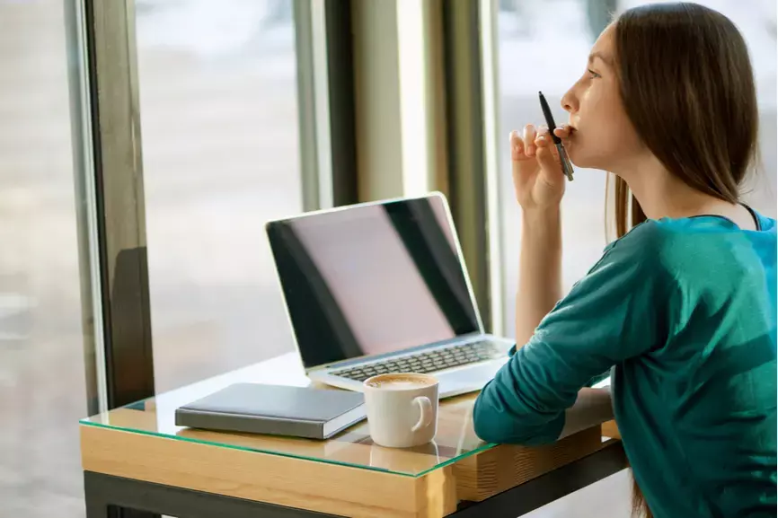 Woman Thinking With Pen