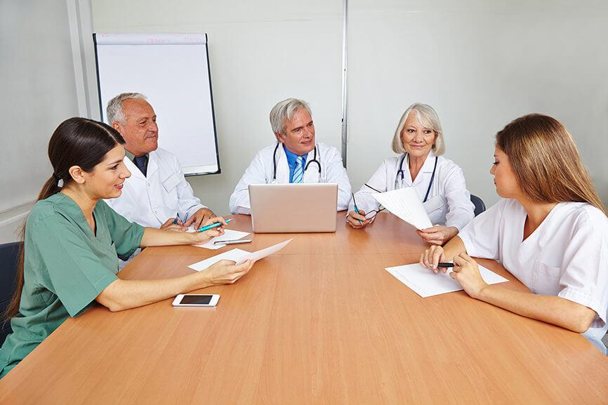 Group of doctors with nurse applicant