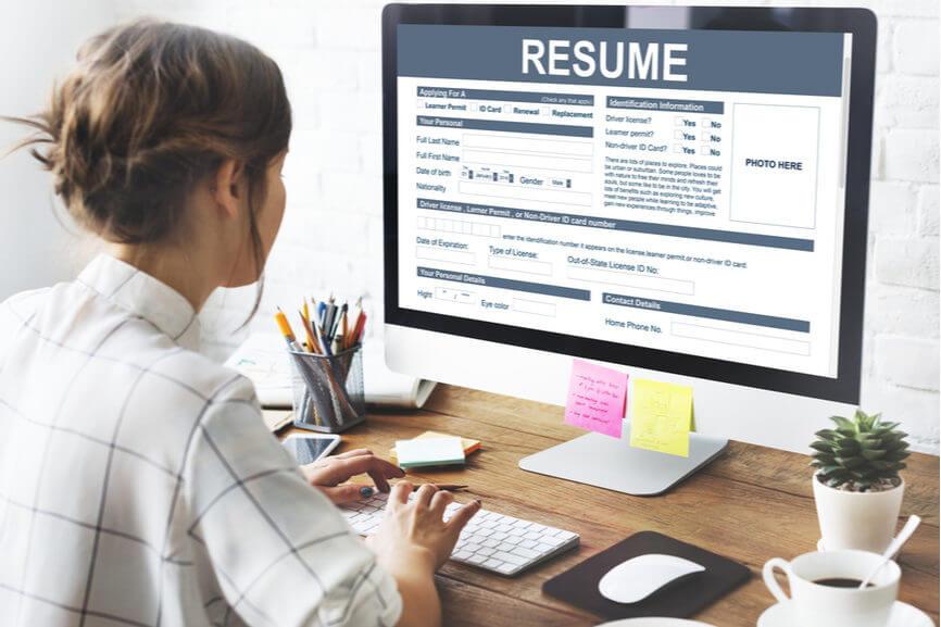 woman filling out resume online