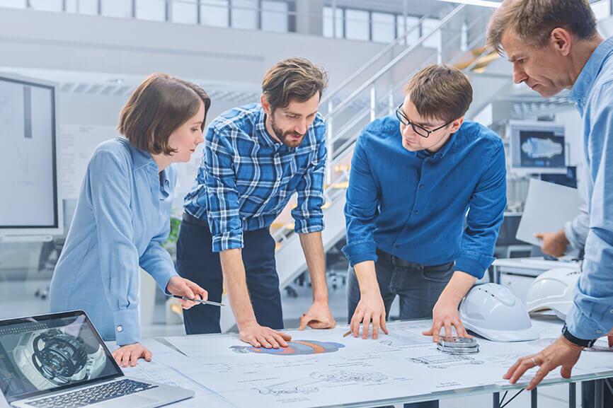 A group of people collaborating at a table