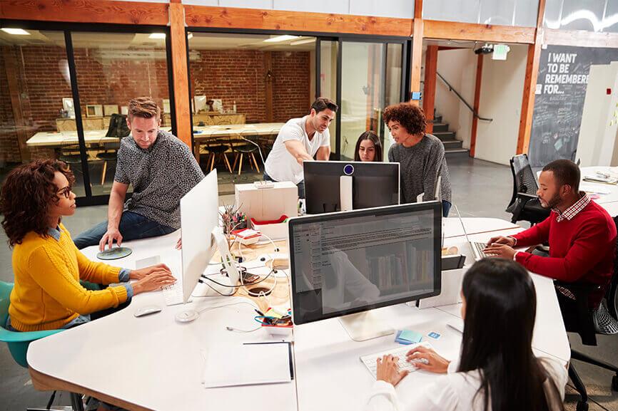 A group of employees working in the office