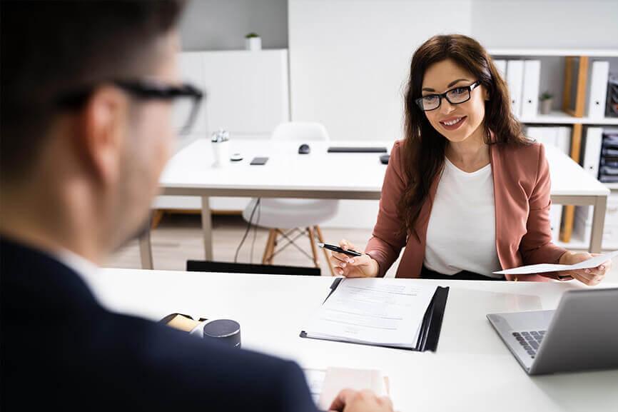 Female interviewer talking to job candidate