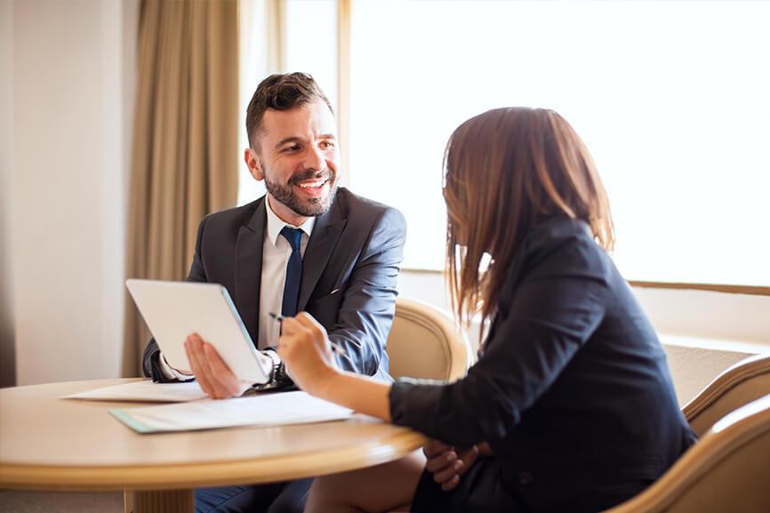 Hotel manager talking to job candidate