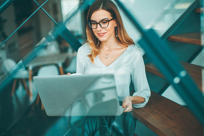 Woman looking at her laptop