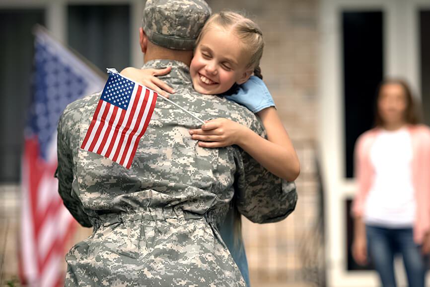 Military man coming home to family