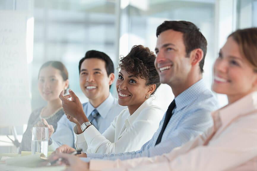 Group of employees smiling