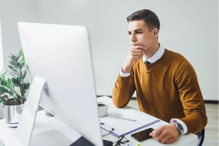 Young Man On Computer